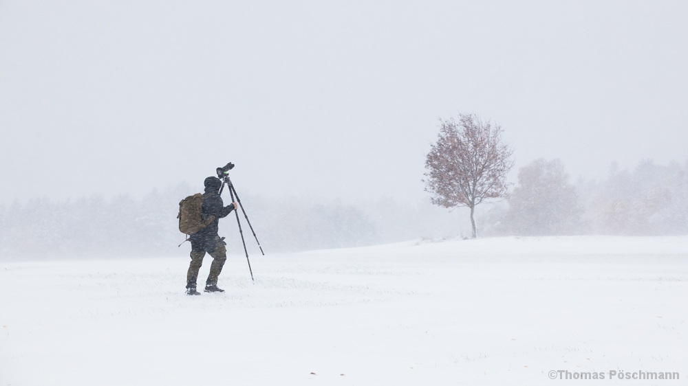 Fotograf im Schneetreiben