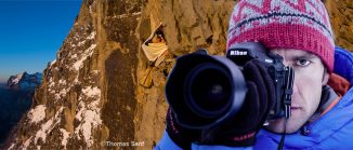 Bildmontage - Fotograf mit Kamera, im Hintergrund Mann im Portaledge